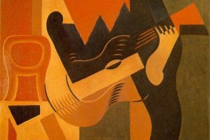 Arlequin assis à la guitare